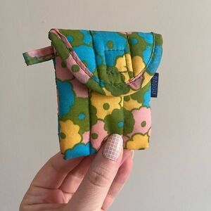 BAGGU puffy earbuds case in flower bed